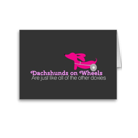 Dachshunds on wheels are just like the other doxies | Note Card